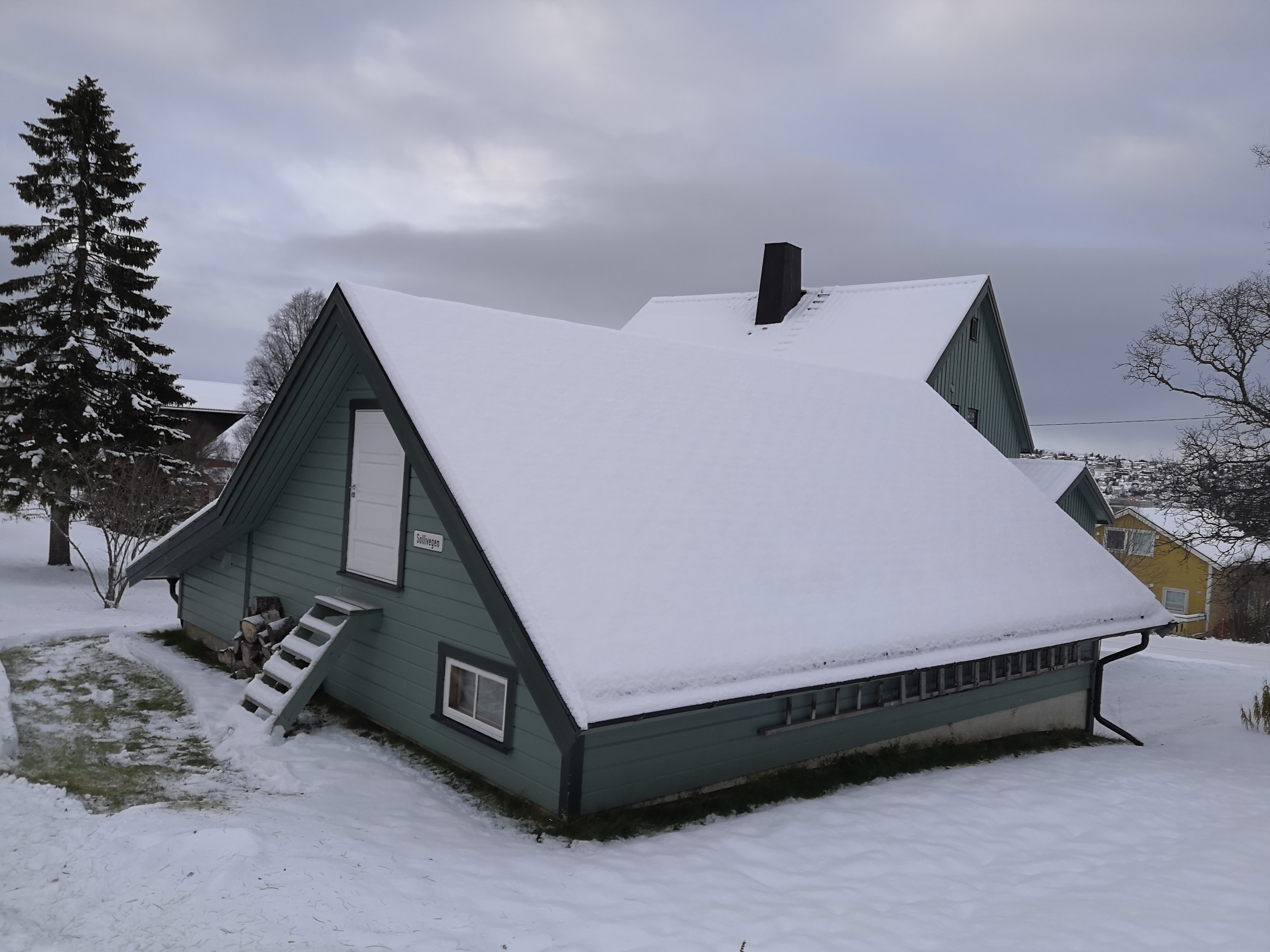 House covered by snow